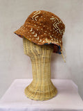 Brown reversible bucket hat
