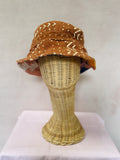 Brown reversible bucket hat